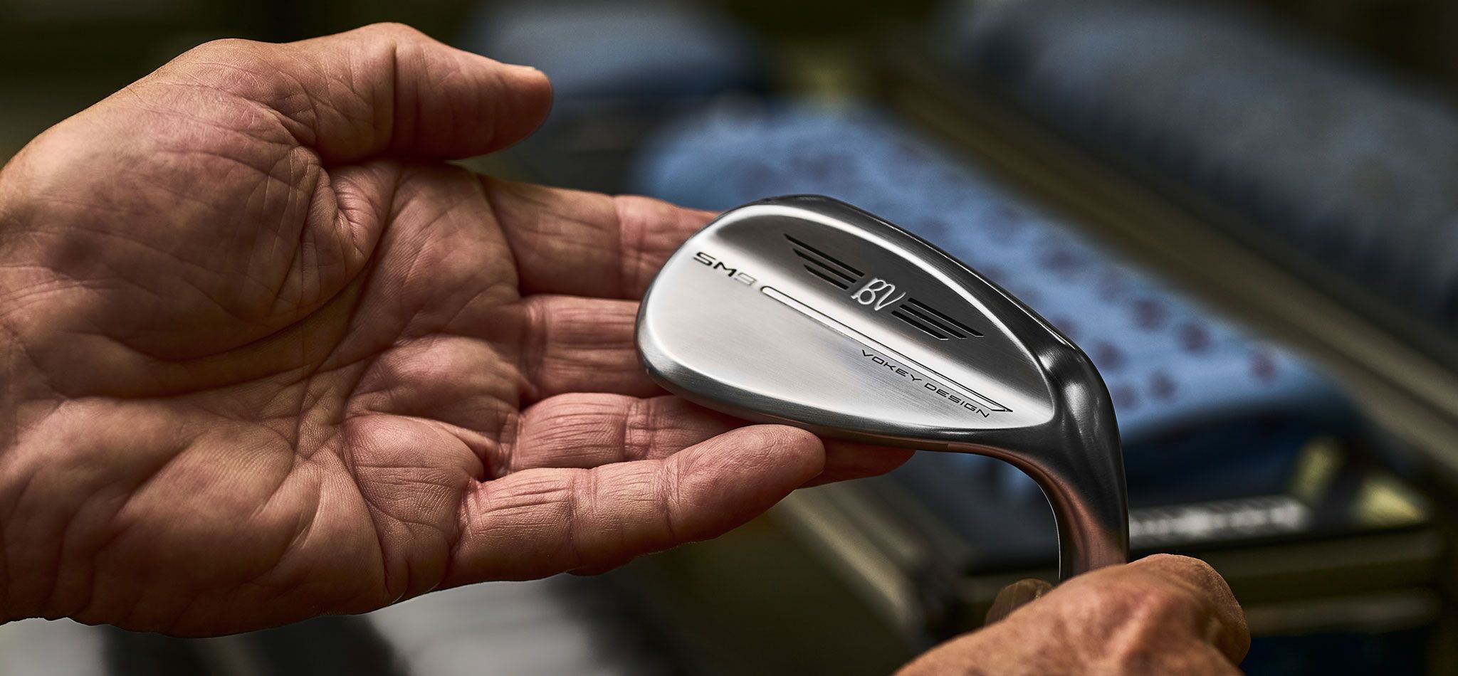 Bob Vokey holding SM9 wedge.